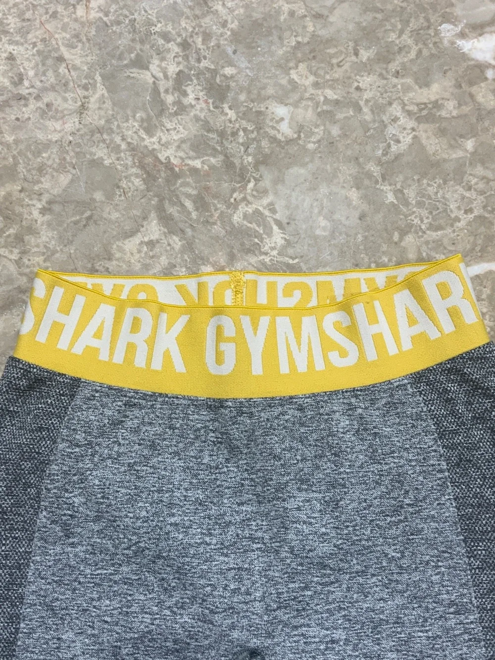 Gymshark Women’s Gray Bike Shorts with Yellow Branded Waistband